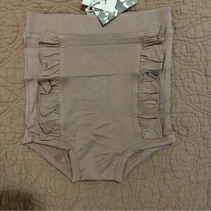 Kate Quinn Tan Ruffle Bottoms